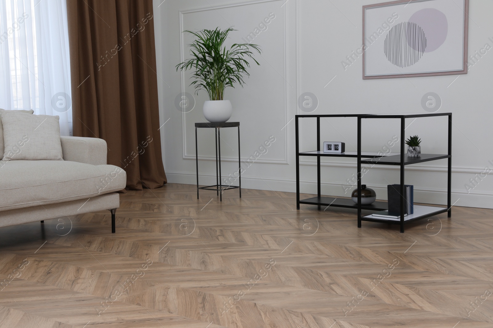 Photo of Modern living room with parquet flooring and stylish furniture