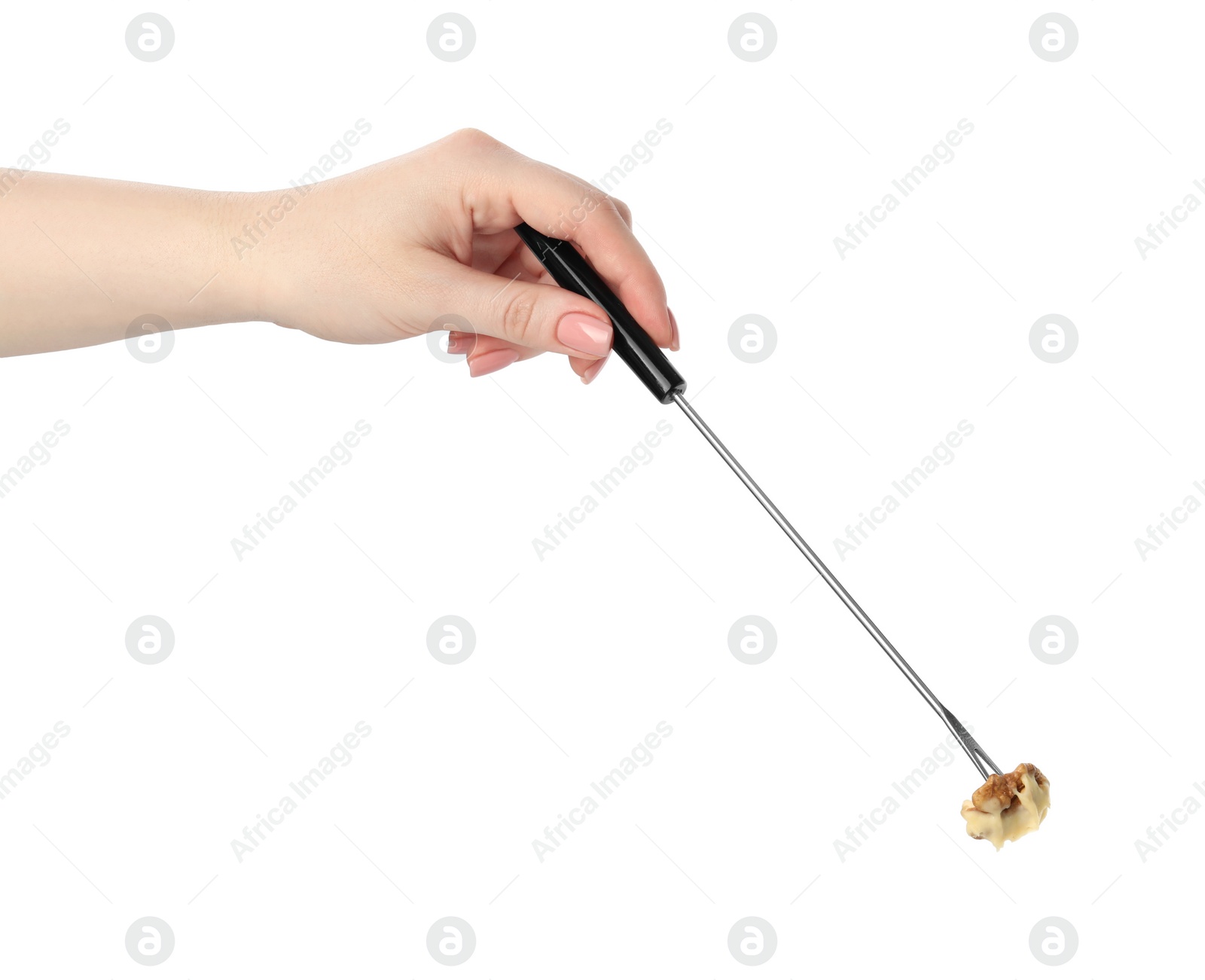 Photo of Tasty fondue. Woman holding fork with walnut and melted cheese on white background, closeup