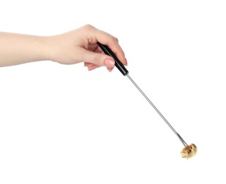 Tasty fondue. Woman holding fork with walnut and melted cheese on white background, closeup