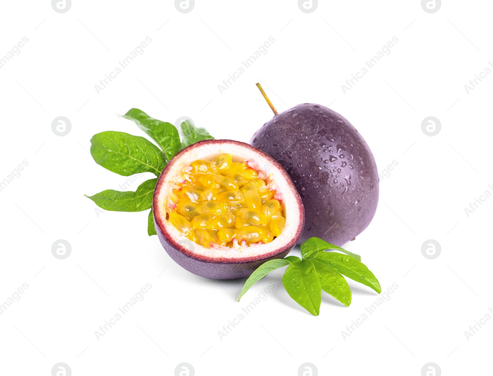 Photo of Cut and whole passion fruits on white background