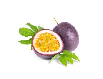 Cut and whole passion fruits on white background