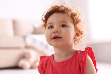 Photo of Portrait of cute little child at home