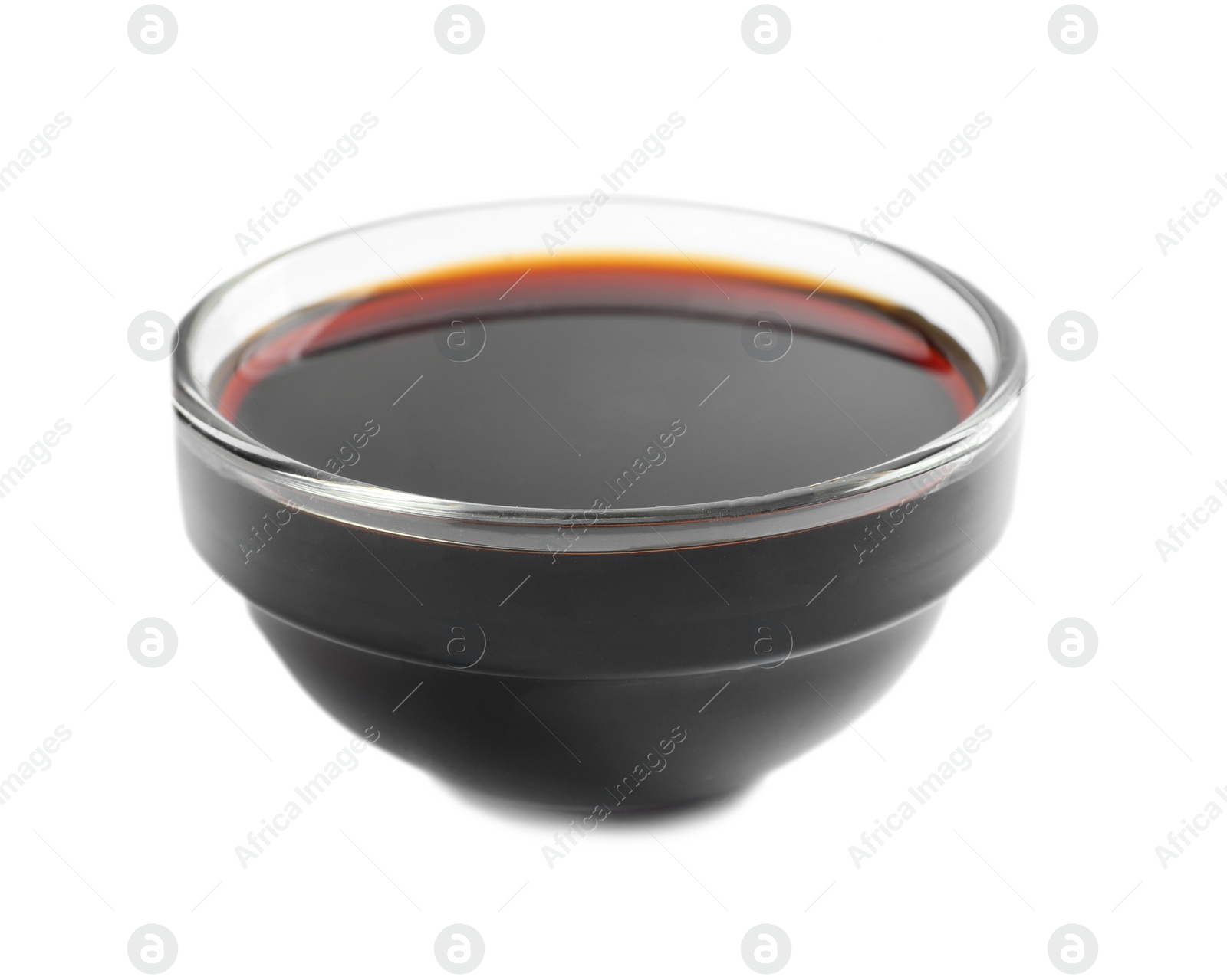 Photo of Traditional soy sauce in bowl on white background