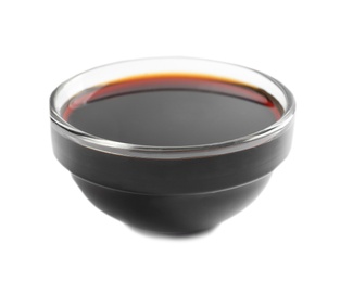 Photo of Traditional soy sauce in bowl on white background