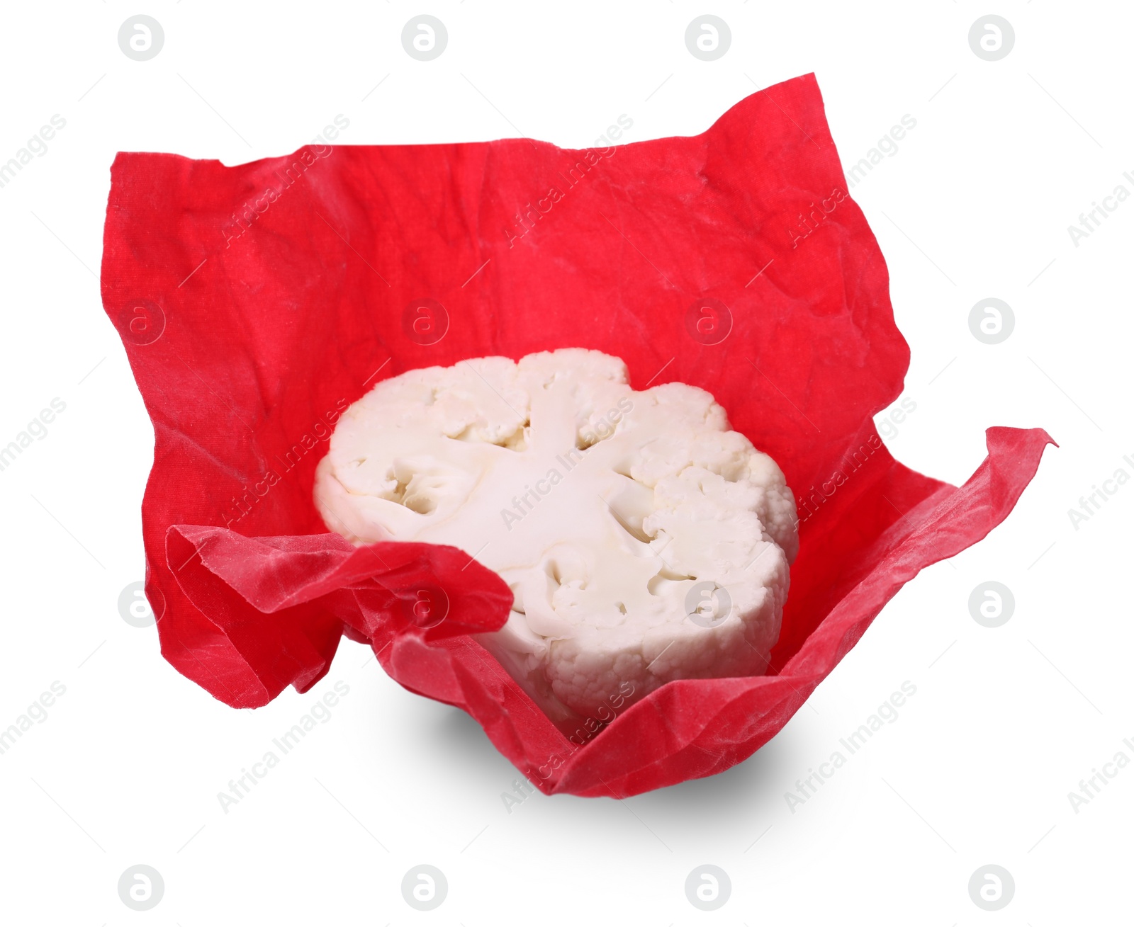 Photo of Cauliflower in red beeswax food wrap on white background