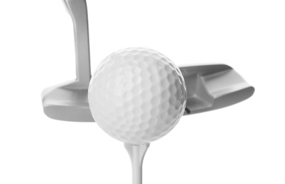 Photo of Hitting golf ball on tee with club against white background