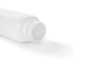 Bottle and scattered dusting powder on white background. Baby cosmetic product
