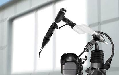 Image of Modern electronic laboratory robot manipulator indoors, closeup. Machine learning