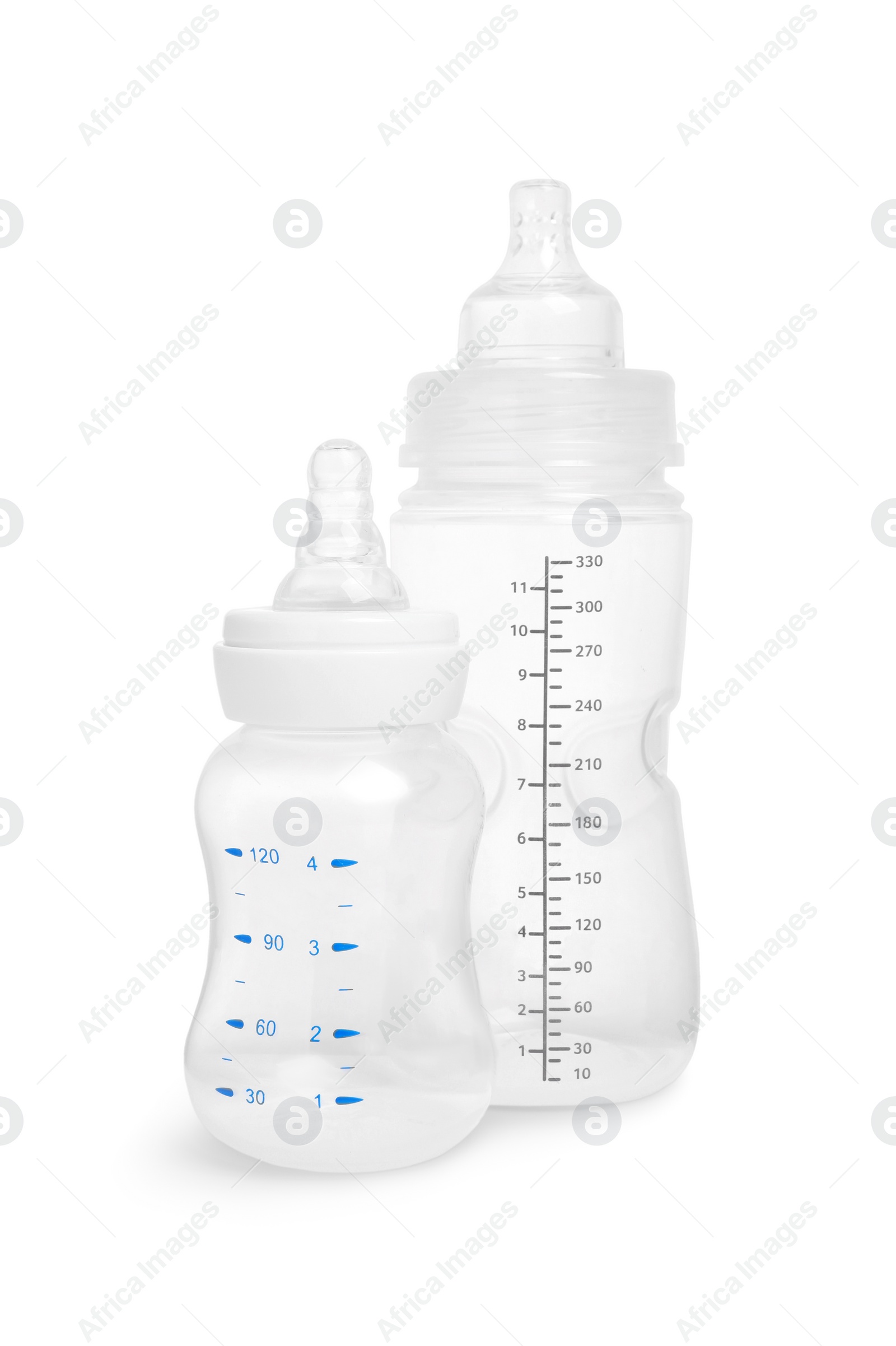 Photo of Two empty feeding bottles for baby milk on white background