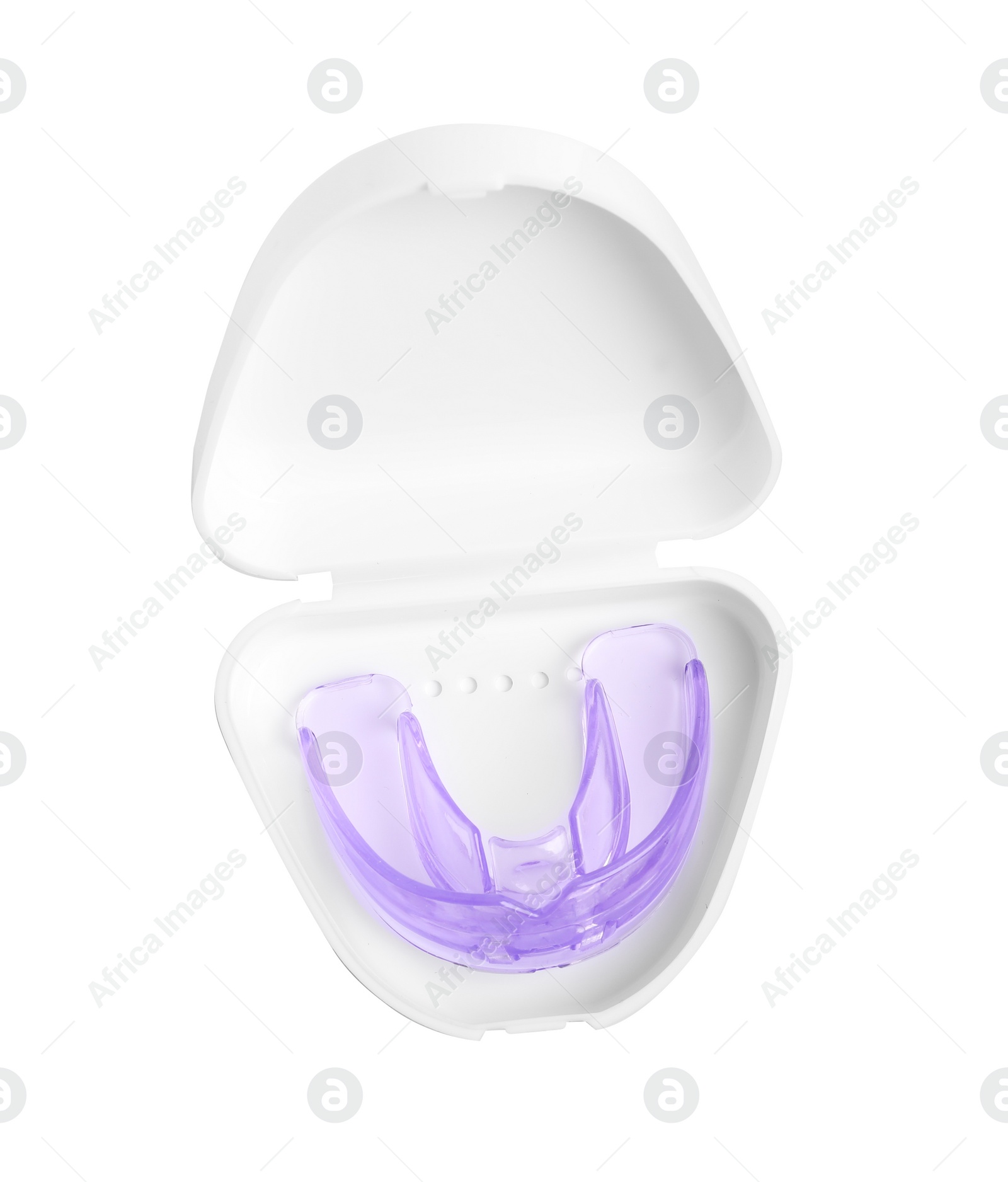 Photo of Container with transparent dental mouth guard isolated on white, top view. Bite correction