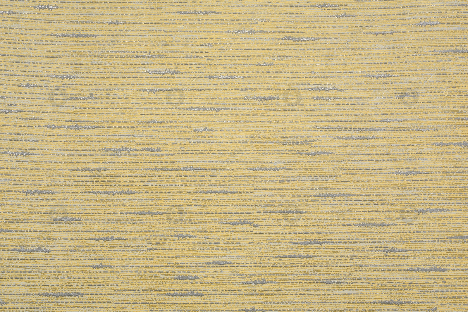 Image of Yellow wallpaper sheet as background, top view