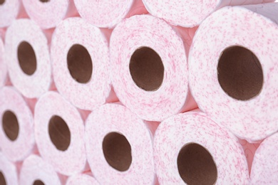 Photo of Many rolls of toilet paper as background. Personal hygiene