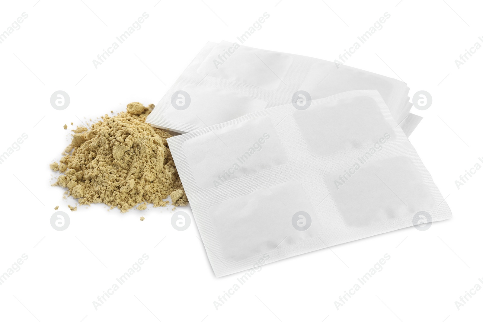 Photo of Mustard powder and plasters on white background