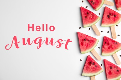 Image of Hello August. Slices of ripe watermelon on white background, flat lay