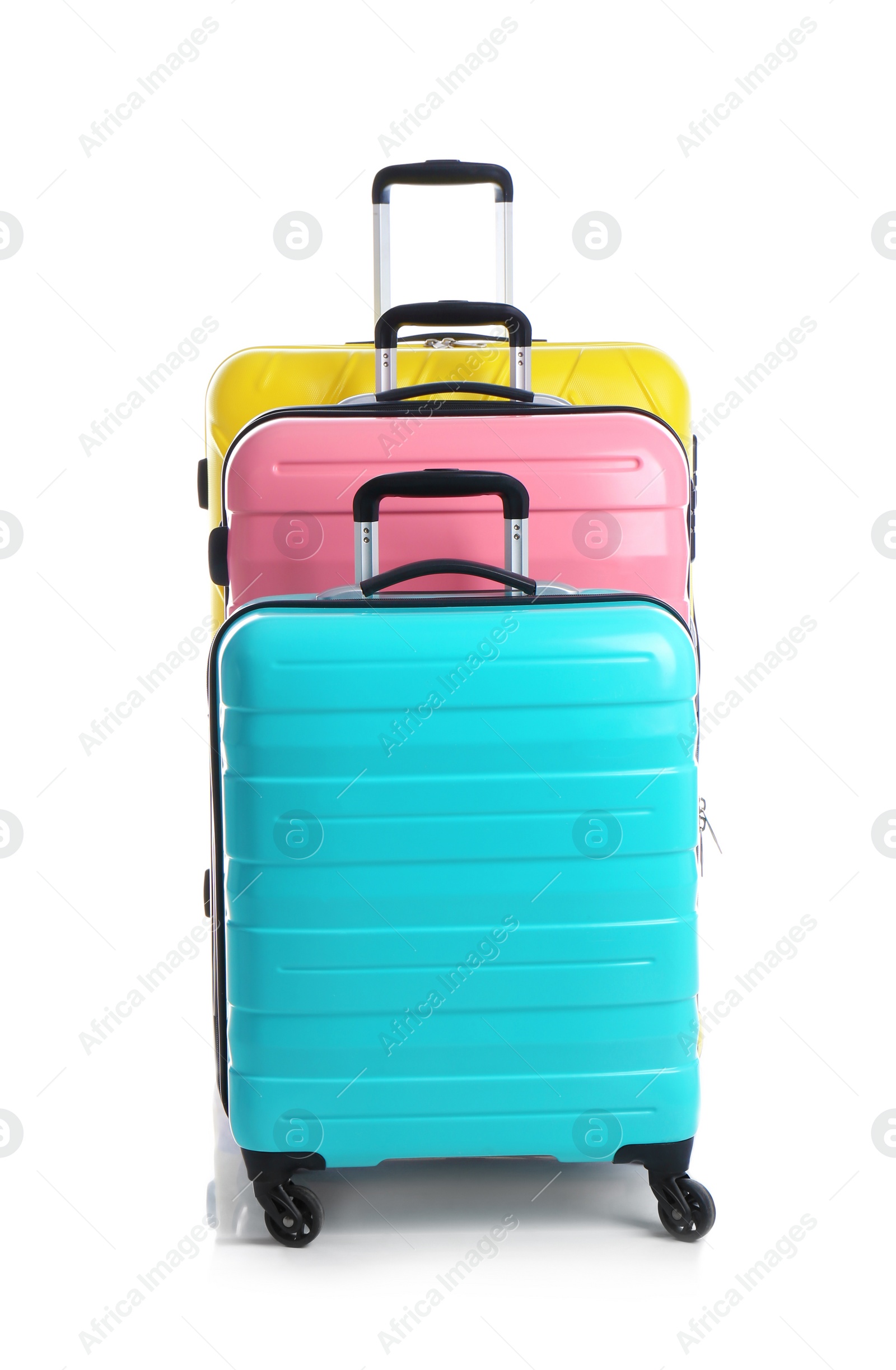 Photo of Modern suitcases for travelling on white background