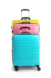 Photo of Modern suitcases for travelling on white background