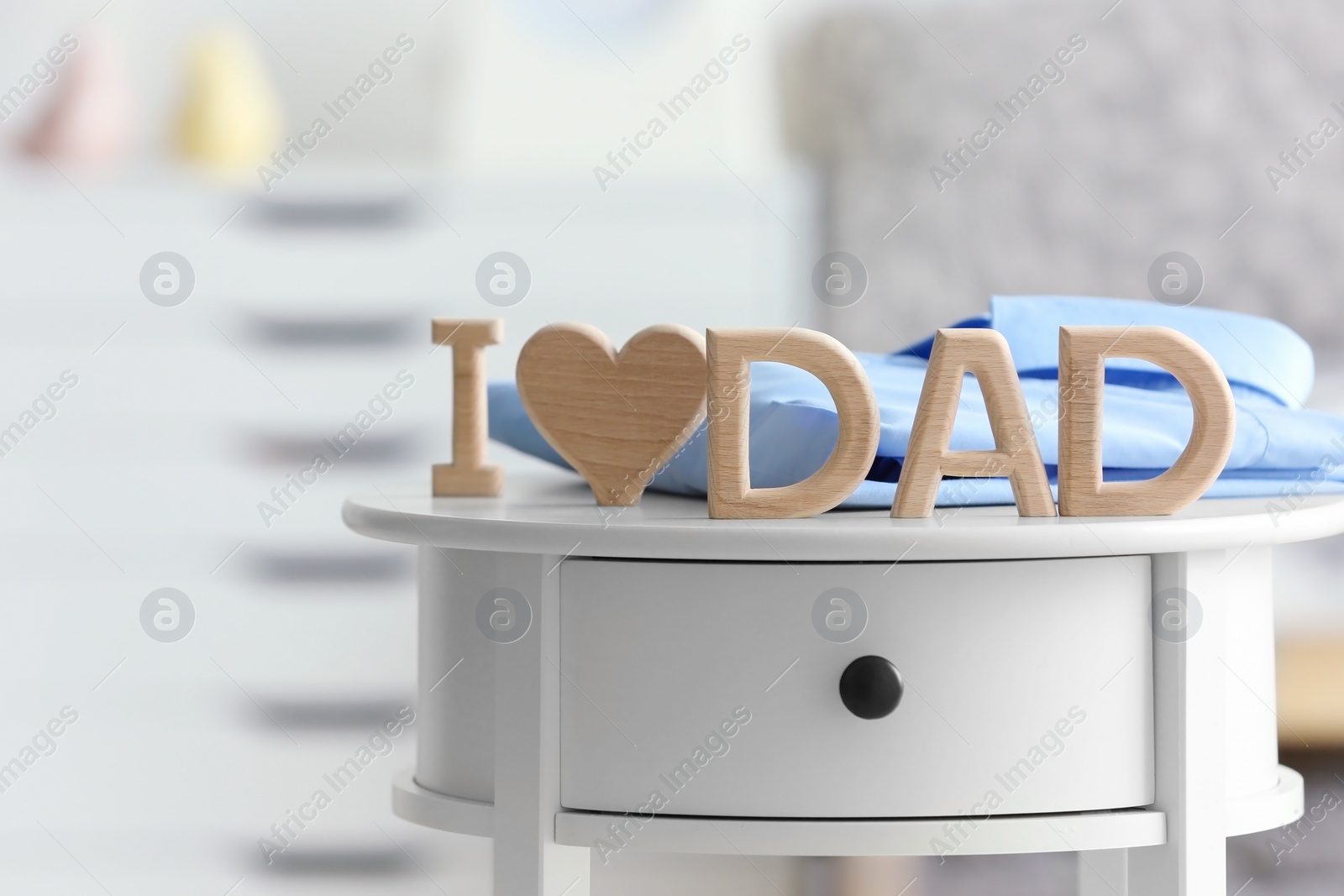 Photo of Phrase "I love dad" on table. Father's day celebration