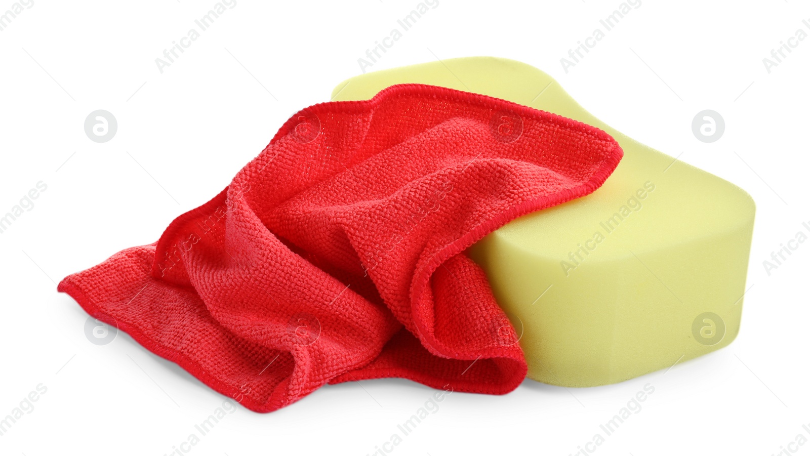 Photo of Sponge and car wash cloth on white background