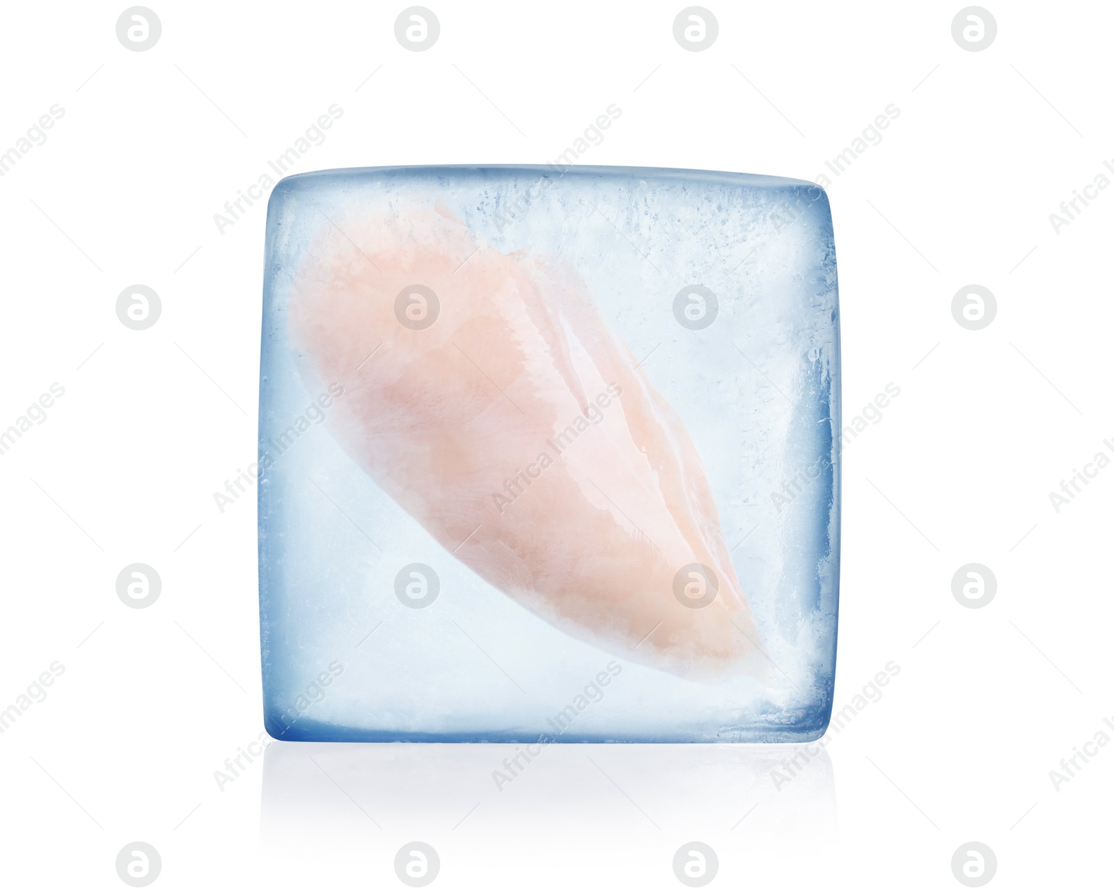 Image of Frozen food. Raw chicken breast in ice cube isolated on white