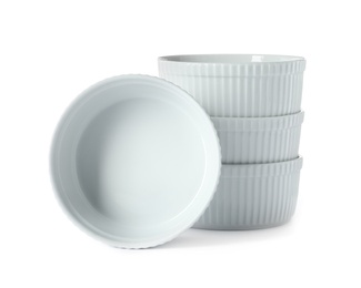 New ceramic bowls on white background. Tableware