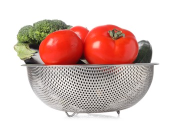 Colander with fresh vegetables isolated on white