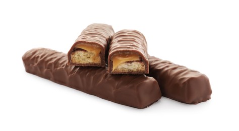 Photo of Sweet tasty chocolate bars with caramel on white background