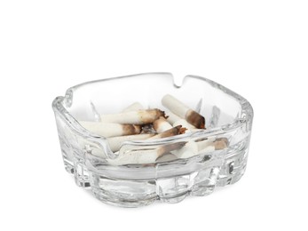 Glass ashtray with cigarette stubs isolated on white