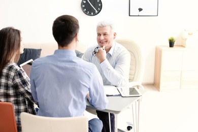 Human resources commission conducting job interview with applicant in office