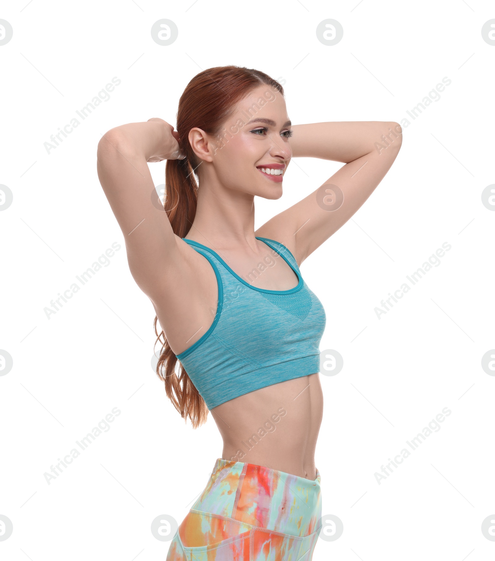 Photo of Young woman wearing sportswear on white background