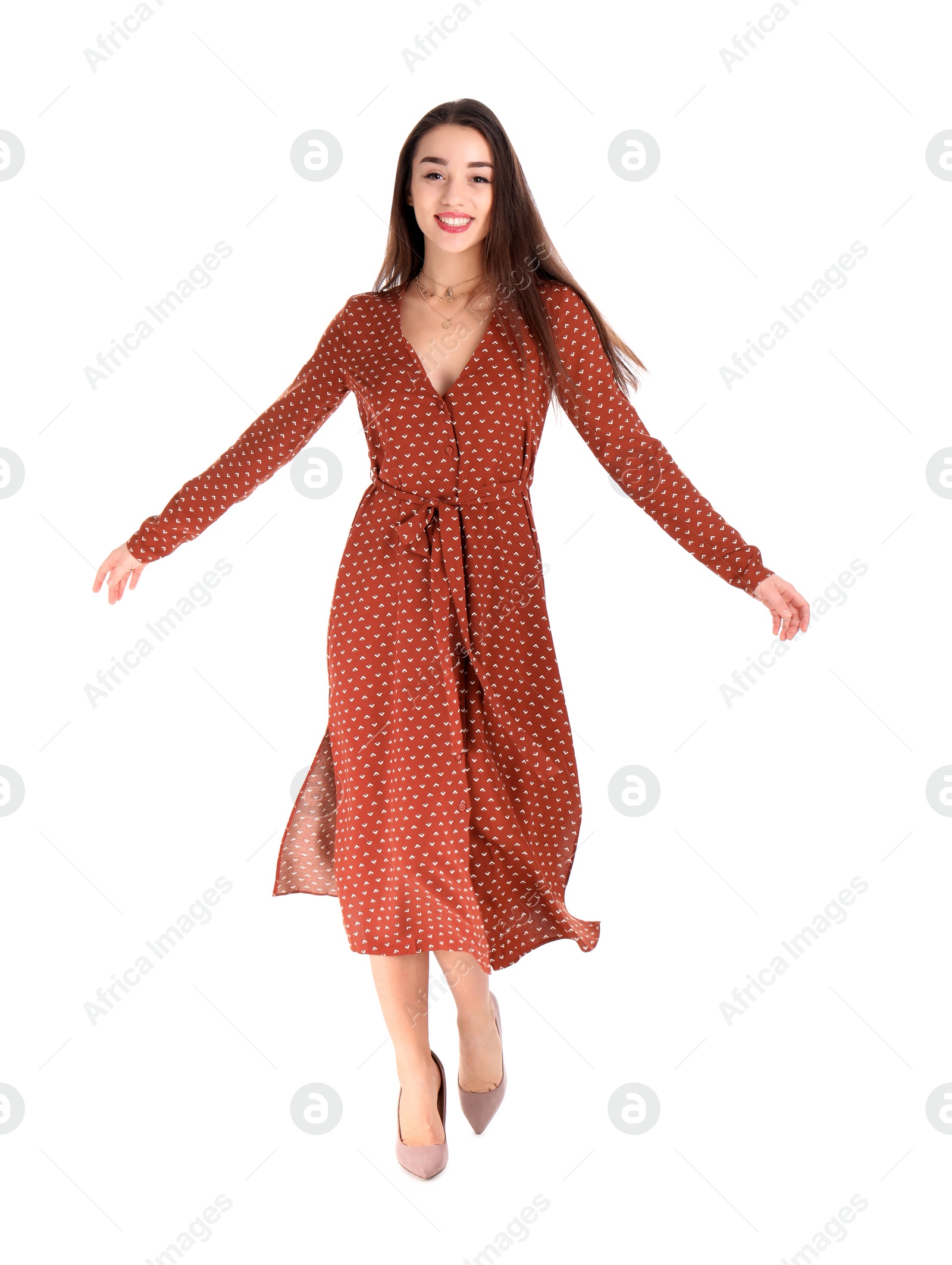 Photo of Portrait of beautiful young woman in stylish dress on white background