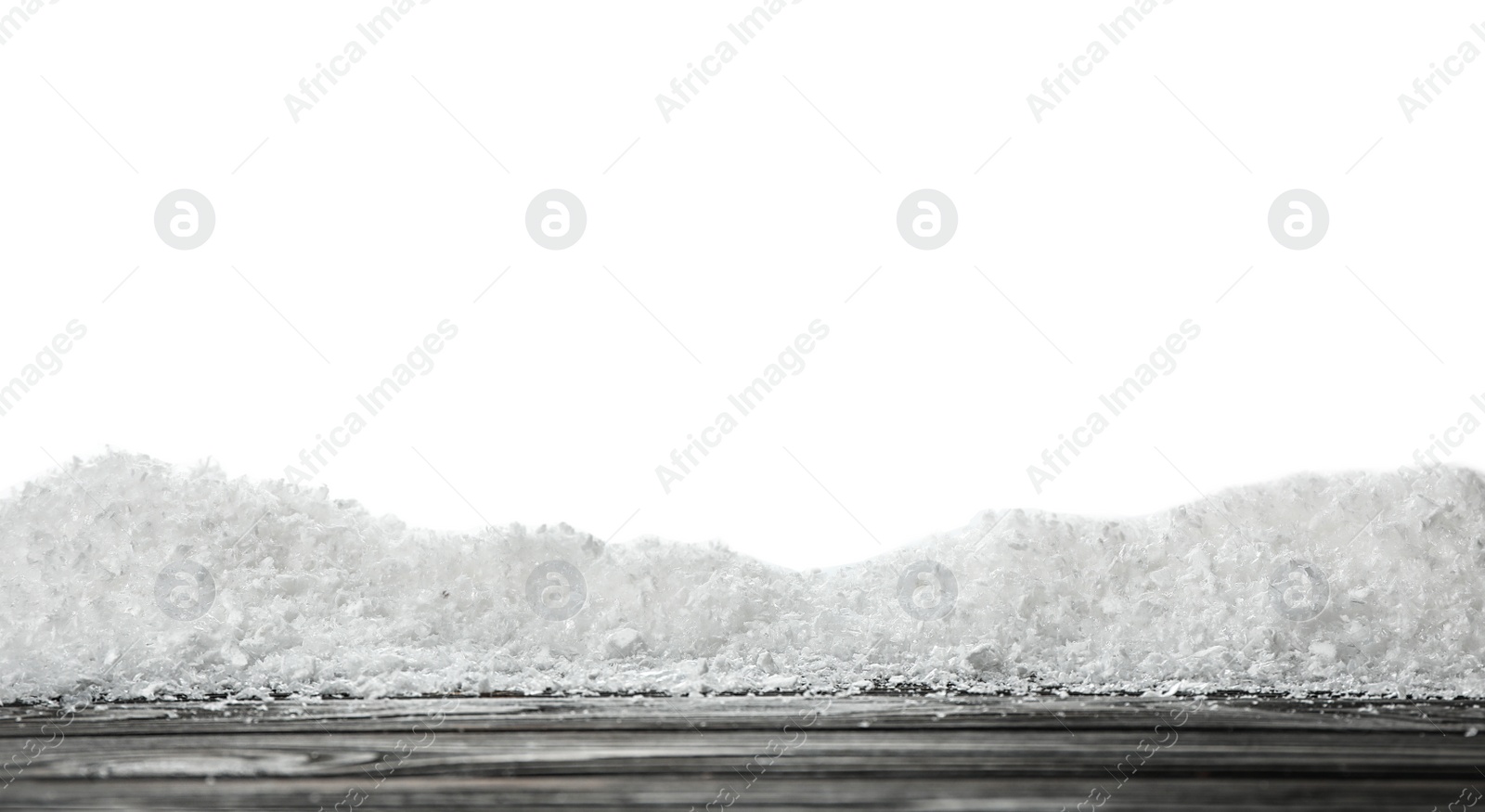 Photo of Wooden surface covered with snow against white background