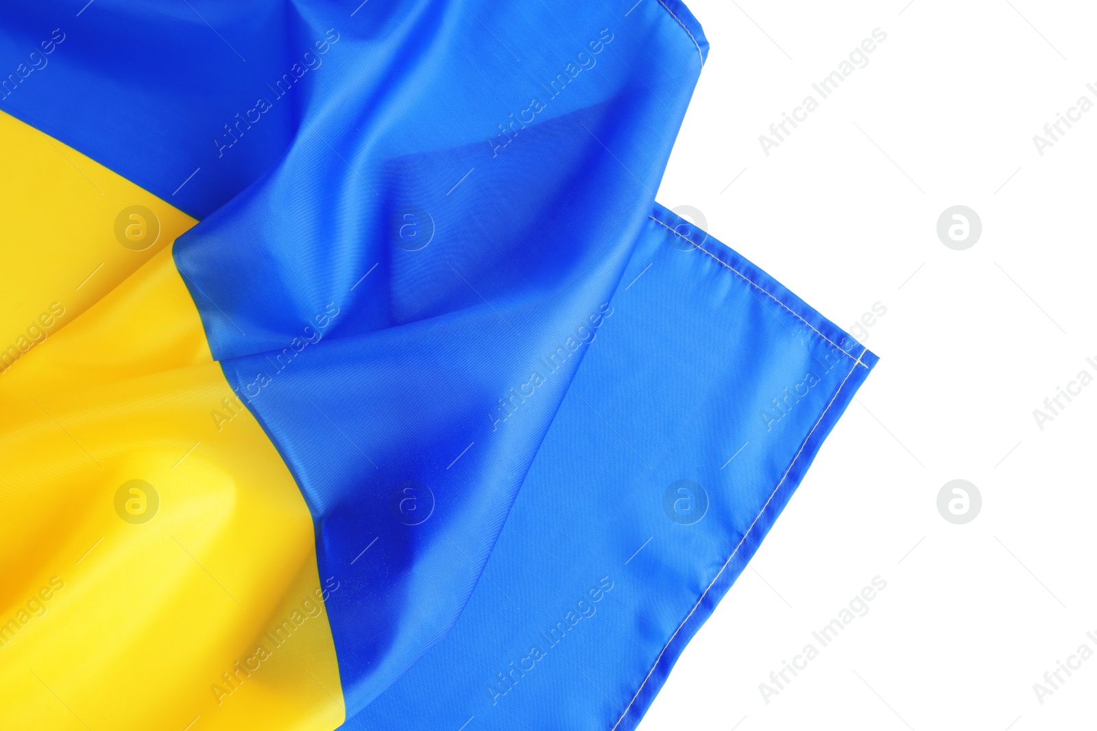 Photo of National flag of Ukraine on white background, top view