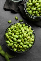 Photo of Organic edamame beans on grey table, flat lay
