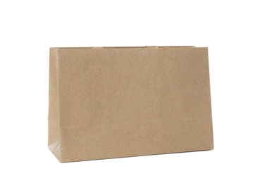 Photo of Paper shopping bag isolated on white. Mock up for design