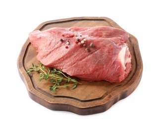 Photo of Piece of raw beef meat with spices and thyme isolated on white