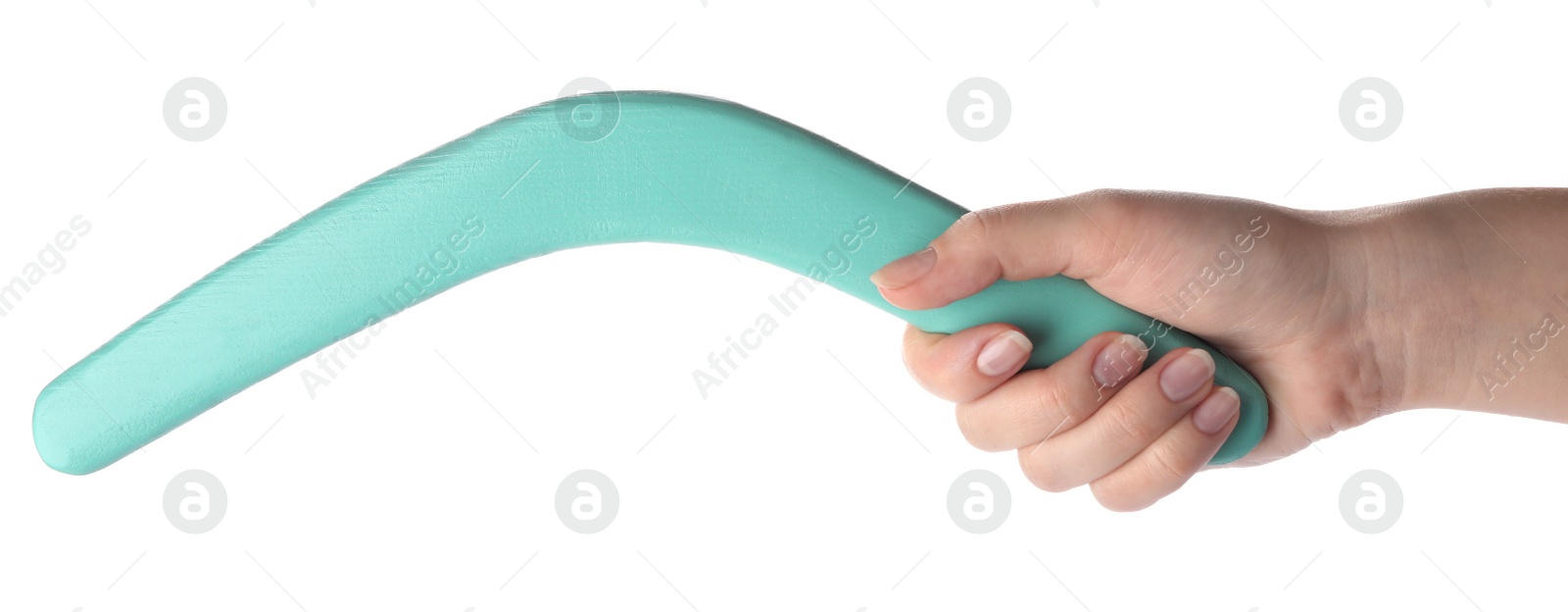 Photo of Woman holding turquoise boomerang on white background, closeup