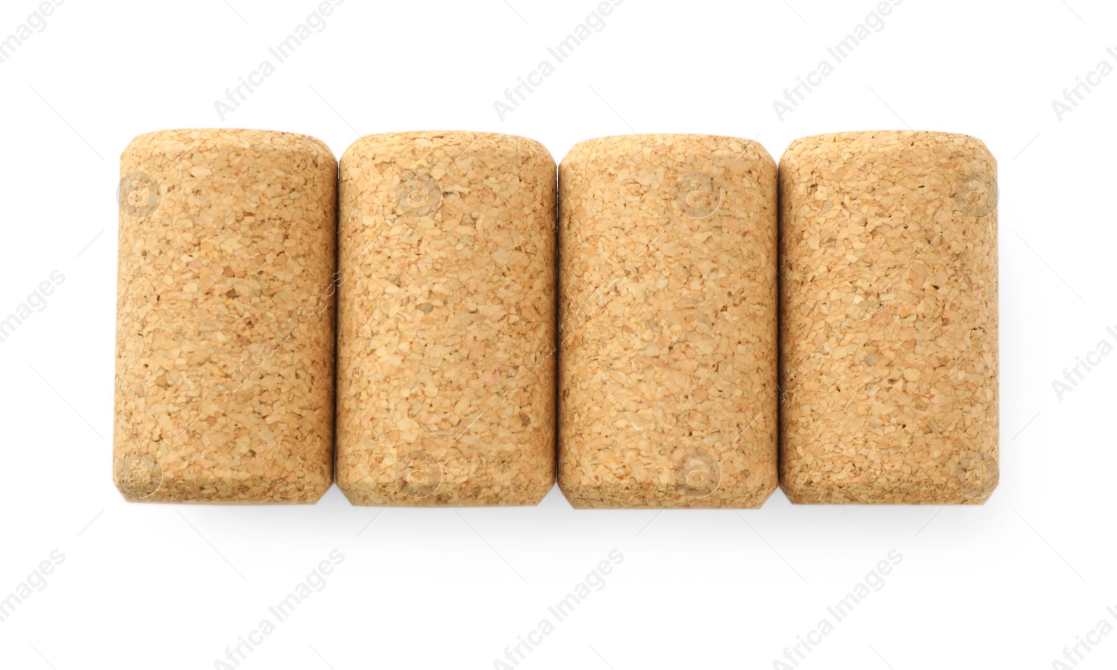 Photo of Set of wine bottle corks isolated on white, top view