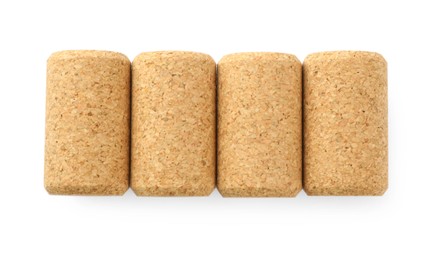 Photo of Set of wine bottle corks isolated on white, top view