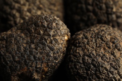 Photo of Closeup view of fresh whole black truffles