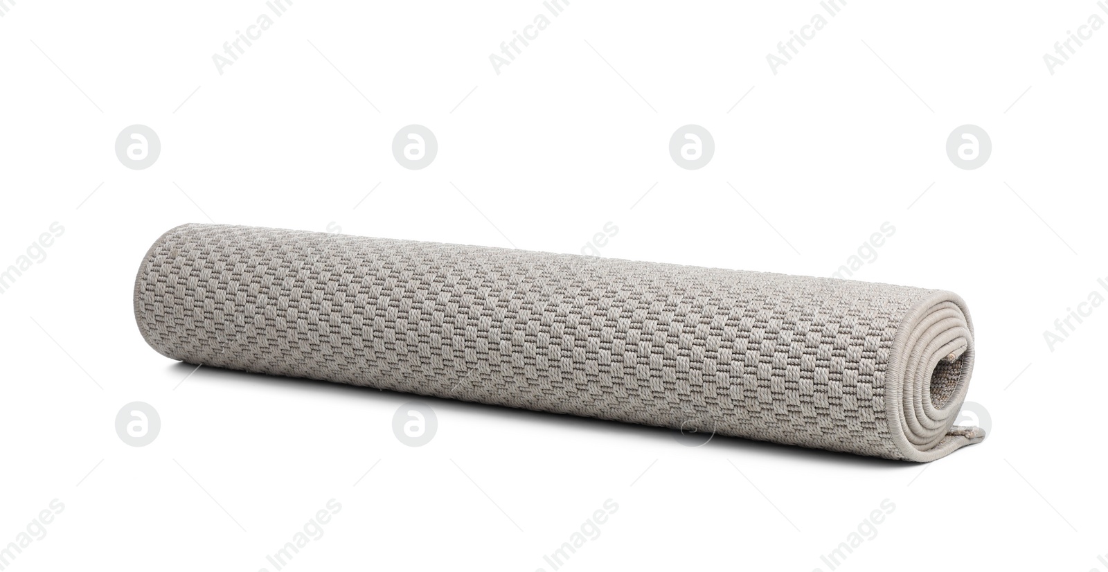 Photo of Rolled grey carpet on white background. Interior element