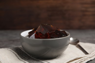 Photo of Delicious grass jelly cubes on table, closeup