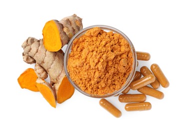 Photo of Bowl with aromatic turmeric powder, pills and cut roots isolated on white, top view