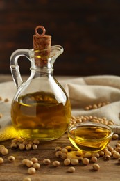 Composition with soybean oil on wooden table