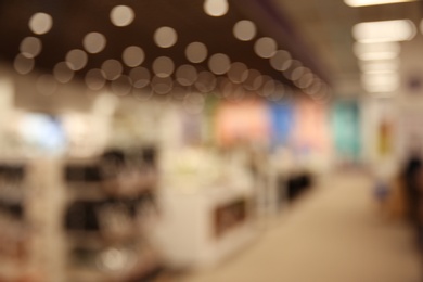 Blurred view of modern shopping mall interior