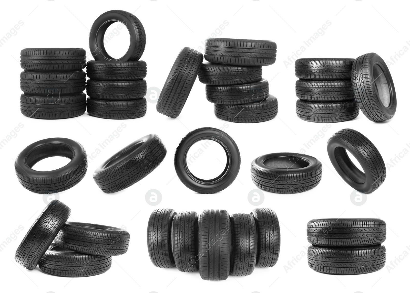 Image of Set with car tires on white background