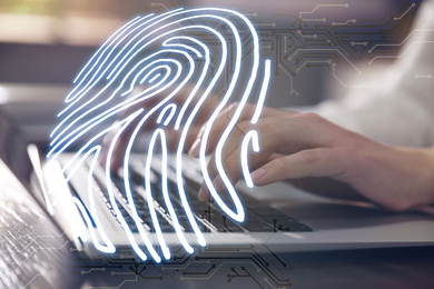 Fingerprint identification. Woman working with laptop at table, closeup