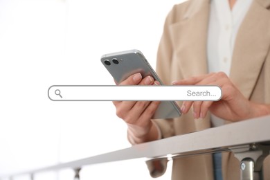 Image of Search bar of website and woman using modern smartphone indoors, closeup