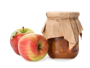 Photo of Tasty apple jam in glass jar and fresh fruits on white background