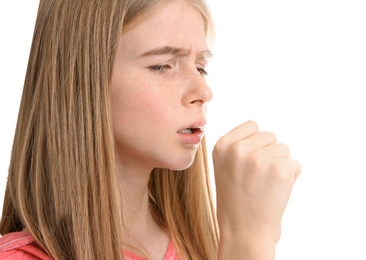 Teenage girl suffering from cough isolated on white