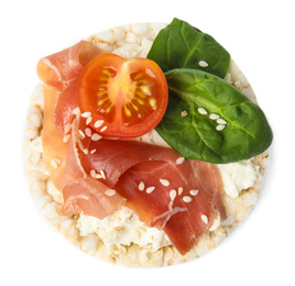 Puffed rice cake with prosciutto, tomato and basil isolated on white, top view